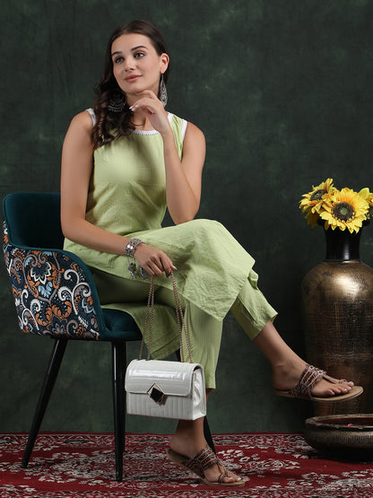 sleevless teek green kurti with pant suit set