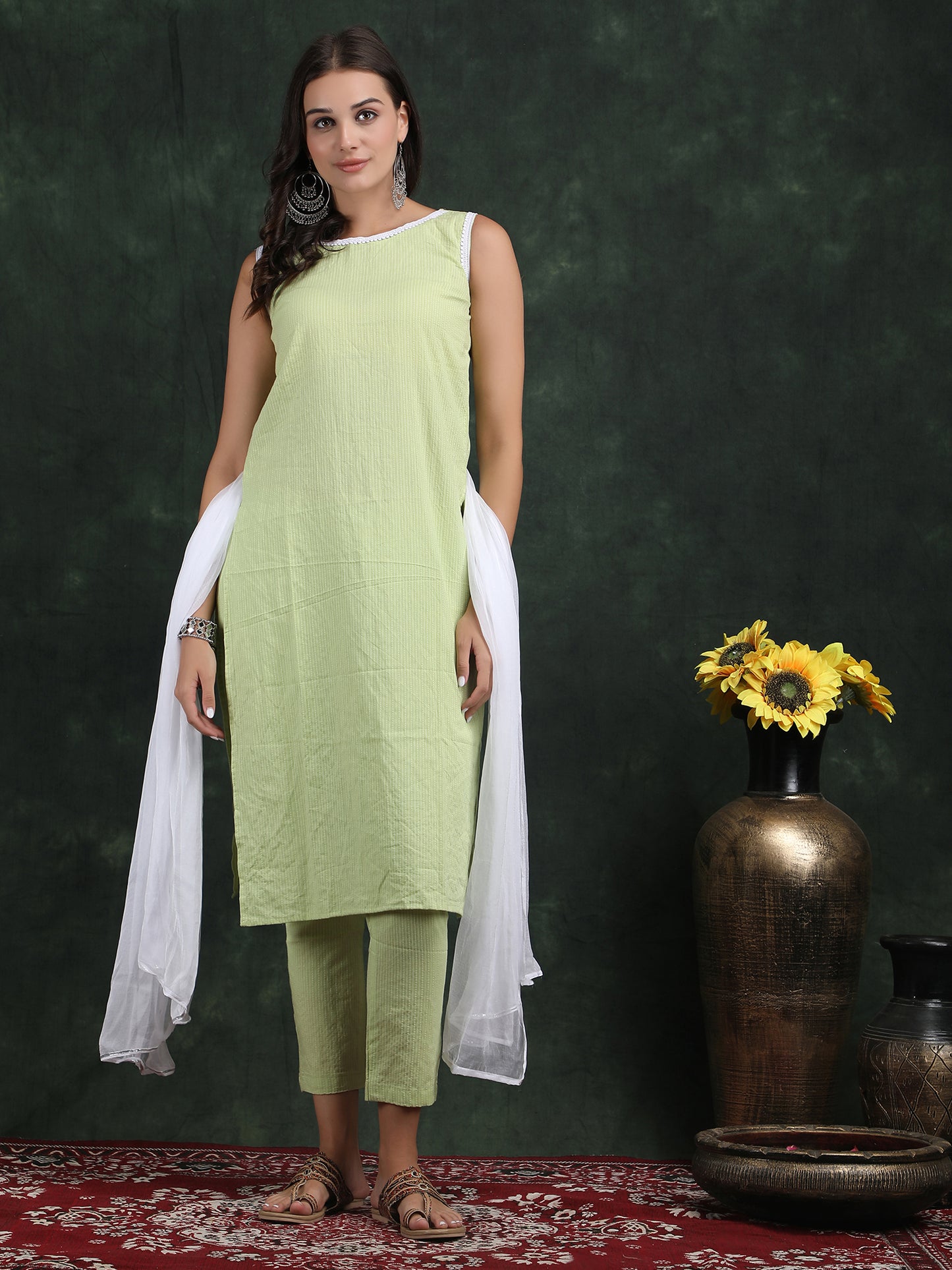 sleevless teek green kurti with pant suit set